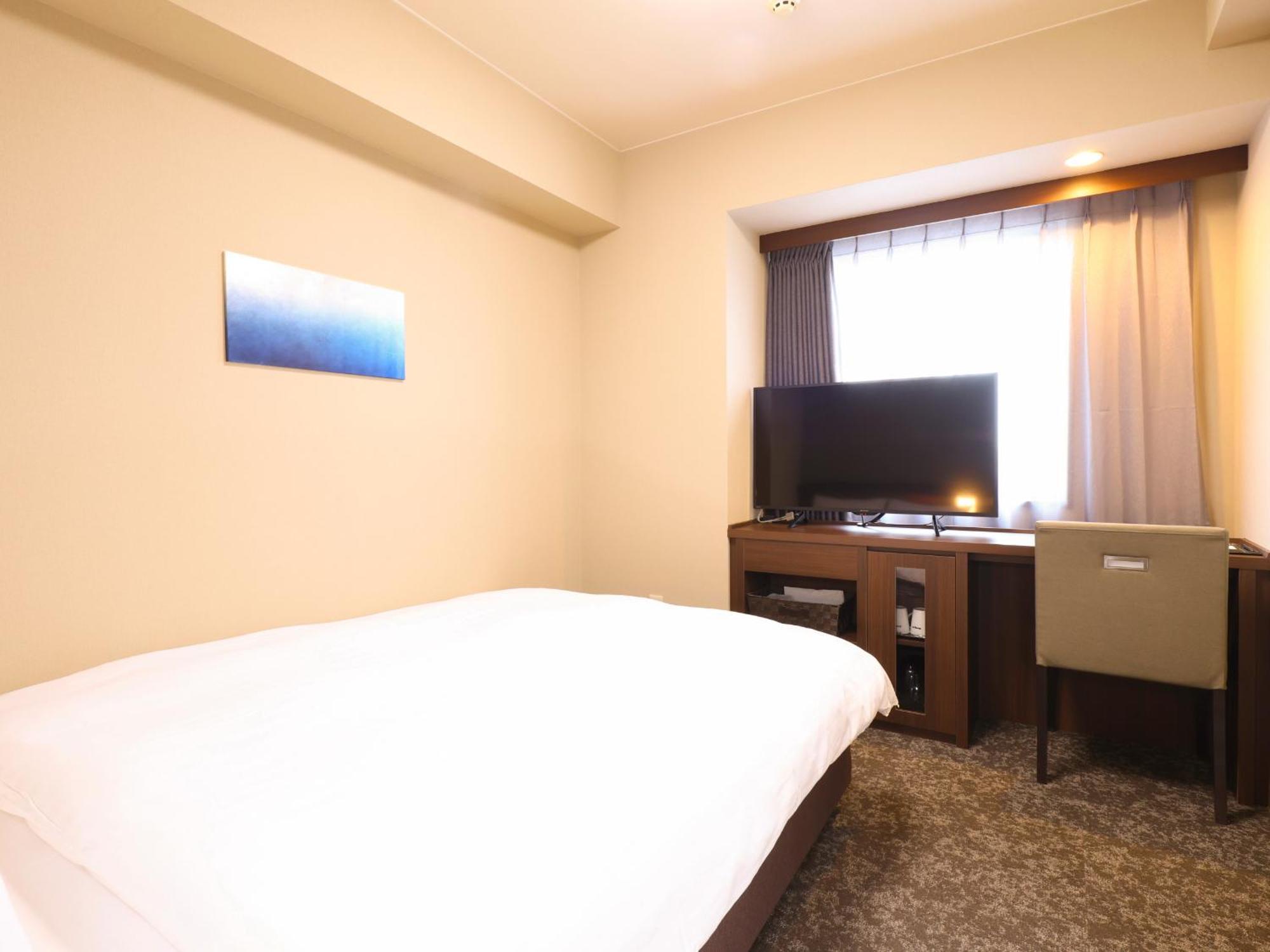 Tennen Onsen Taho-No-Yu Dormy Inn Ніїґата Номер фото
